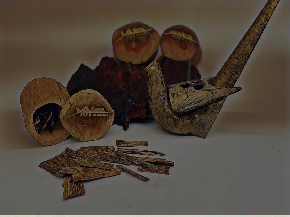 Cross-section of oud (agarwood) wood pieces with a Sifr Aromatics label, Kampong Gelam