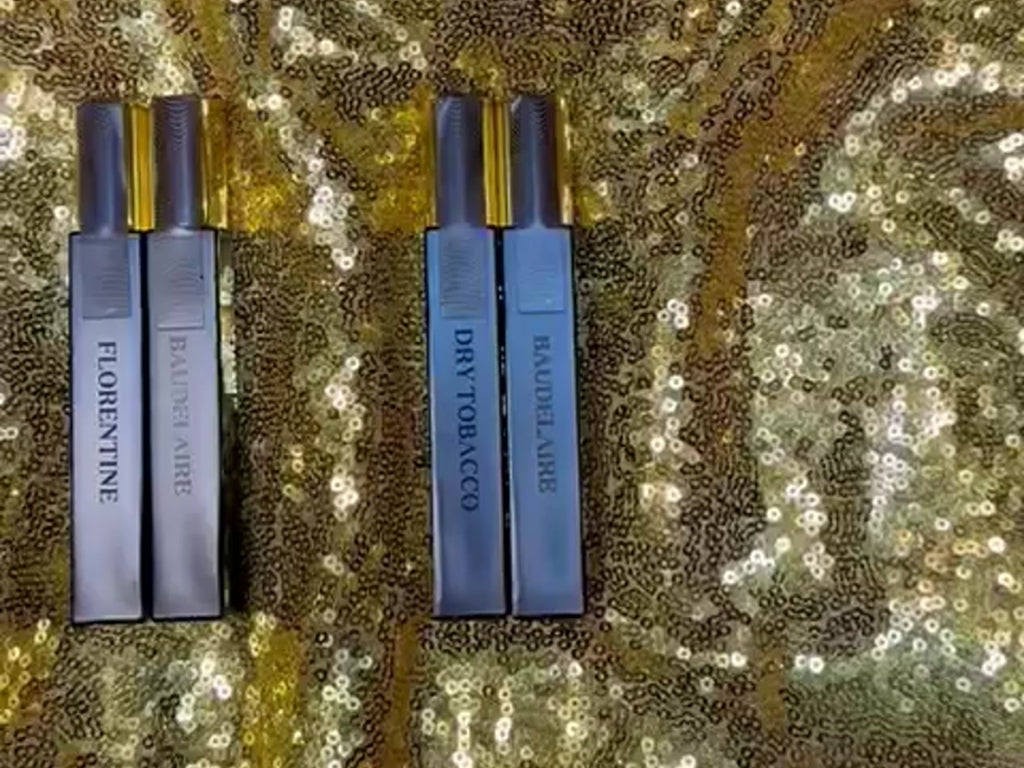 Luxury niche fragrance Sifr Aromatics Quad Travel Edition featuring four 10 ml Eau de Parfum black spray bottles with elegant in-house laser engraving—perfect travel-size perfume set for jet-setters and premium gifting