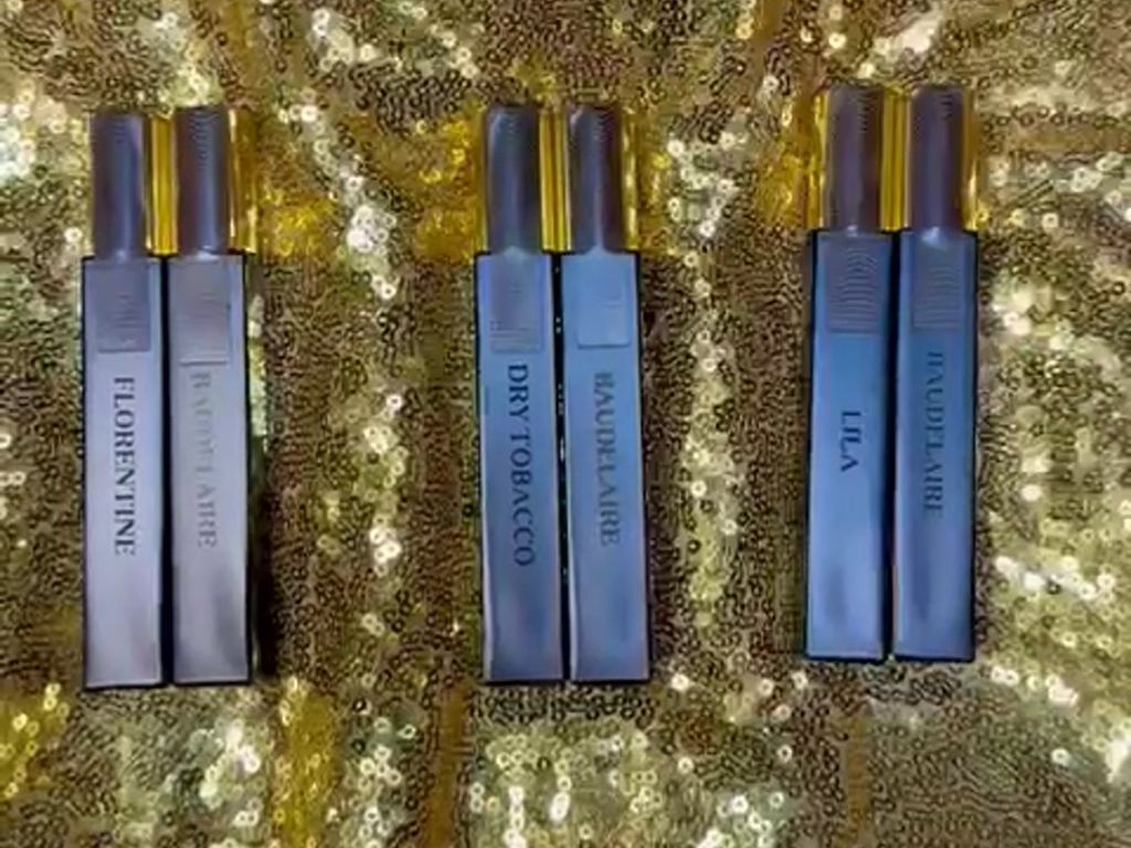 Luxury niche fragrance Sifr Aromatics Travel Edition Set of 6 with six 10 ml Eau de Parfum black spray bottles, each finished with elegant in-house laser engraving—premium travel-size perfume collection ideal for gifting or jet-setting