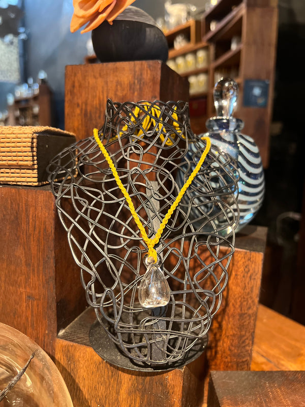 Clear Aroma Pendant with yellow braided chain