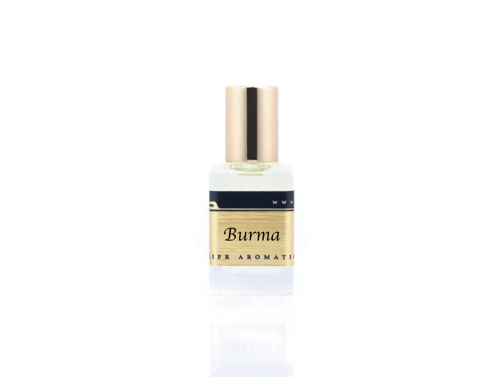 15ml roller ball oil perfume bottle placed elegantly on a white background. The bottle is sleek and cylindrical, with a smooth glass body and a polished metal roller ball at the top. The label on the bottle is designed in gold and black, featuring Sifr Aromatics' logo and the perfume name 'Burma.' The overall aesthetic is clean and sophisticated, highlighting the high-quality craftsmanship of the product