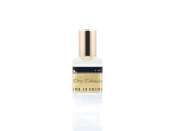 15ml roller ball oil perfume bottle placed elegantly on a white background. The bottle is sleek and cylindrical, with a smooth glass body and a polished metal roller ball at the top. The label on the bottle is designed in gold and black, featuring Sifr Aromatics' logo and the perfume name 'Dry Tobacco.' The overall aesthetic is clean and sophisticated, highlighting the high-quality craftsmanship of the product