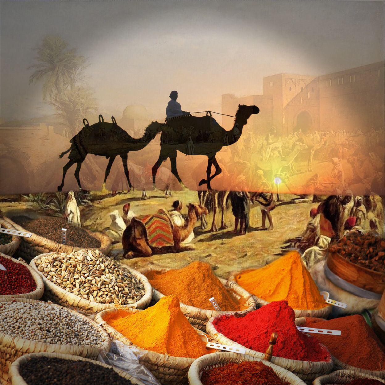 Desert landscape with sand dunes, camels, and colorful spices. The scene evokes the ancient spice trade routes of the Silk Road, with Eastern spices like clove, cardamom, and black pepper, followed by teakwood and the dry musky canvas of Bedouin tents. Key ingredients: Ambergris, Sandalwood