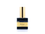 50ml spray bottle of Eau De Parfum placed elegantly on a white background. The bottle is sleek and black, with a polished gold cap. The label on the bottle is designed in gold and black, featuring Sifr Aromatics' logo and the perfume name 'Ainur.' The overall aesthetic is clean and sophisticated, highlighting the high-quality craftsmanship of the product.